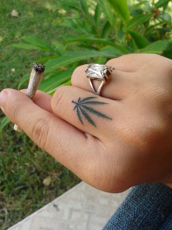 small meaningful stoner tattoo ideas leaf finger
